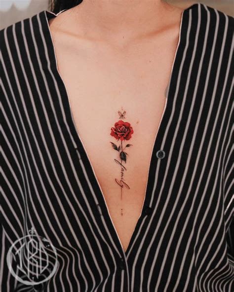 small rose tattoo between breast|35 Beautiful Rose Tattoos for Women & Meaning